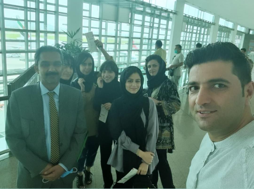 Aghan Robotics team at the airport